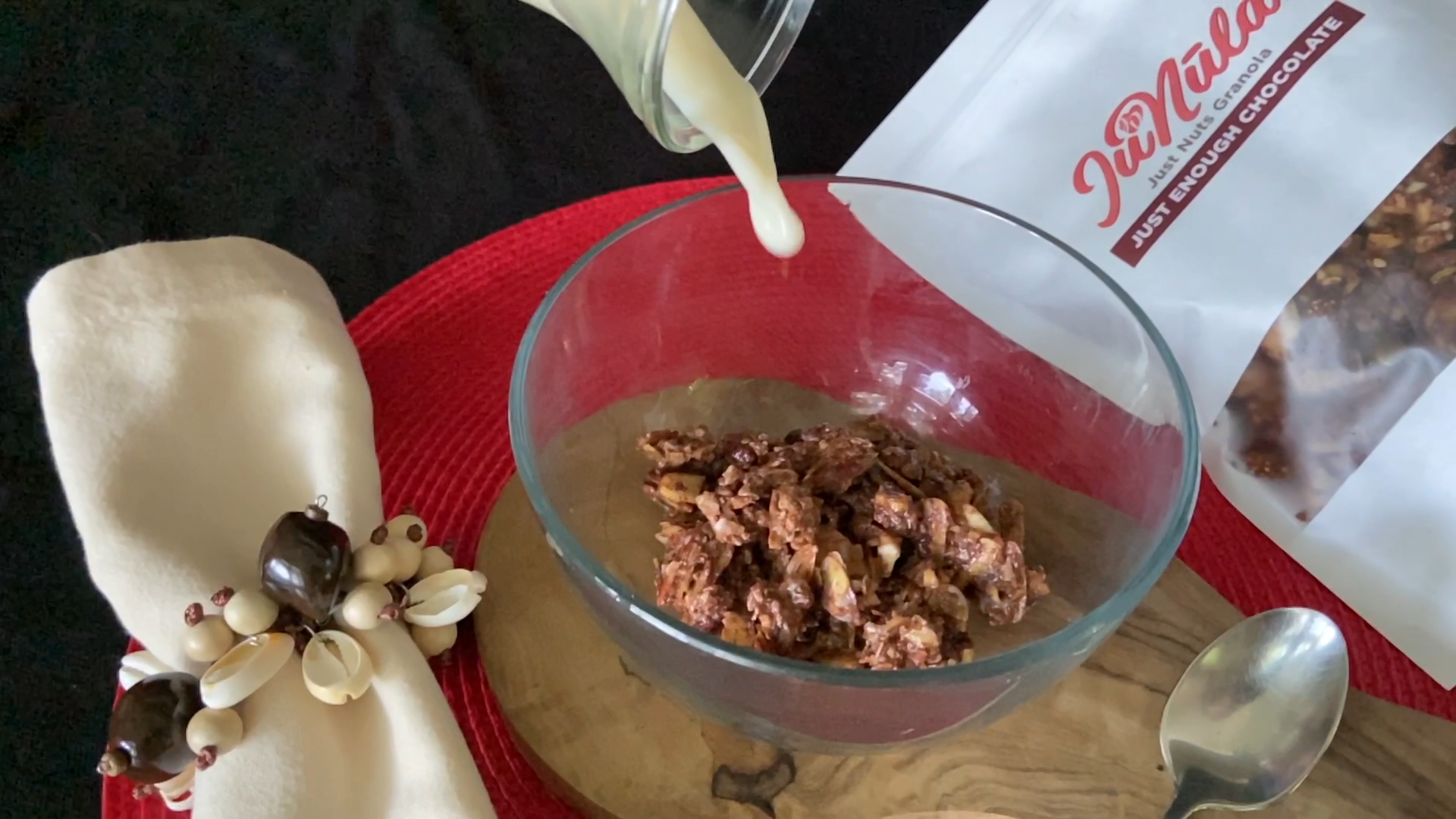 Photo of milk being poured on JuNūla Just Nuts Granola in a bowl
