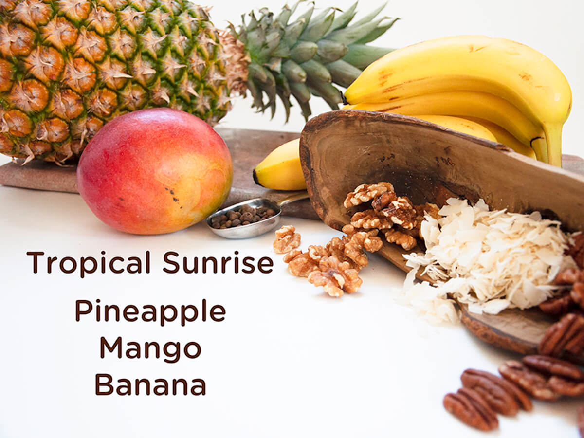 Photo of pineapple, mango, banana, and allspice, the unique flavors in Tropical Sunrise JuNūla Just Nuts Granola